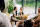 people eating at restaurant, plates of food